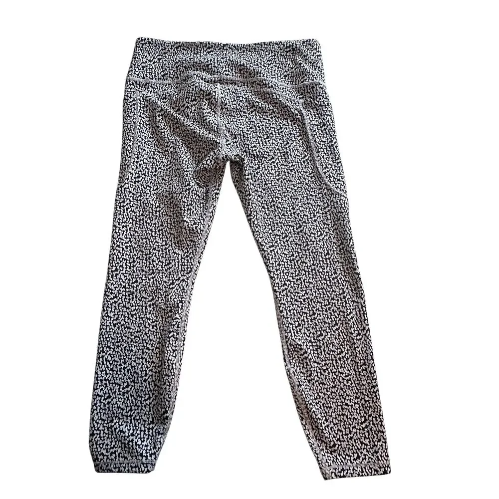 Athleta Ultimate Stash Textured 7/8 Leggings Womens Large Camilla Water Violet